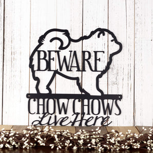 Chow Chows Live Here metal plaque, with Beware, in matte black powder coat. 