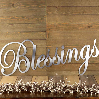 Blessings metal sign with cursive lettering, in raw steel.