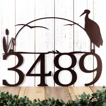 4 digit metal house number sign with heron and cattails, in copper vein powder coat. 