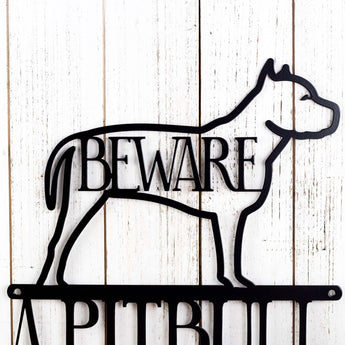 Close up of Pitbull dog breed silhouette, in matte black powder coat.