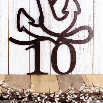 Close up of 5 inch house number on the nautical metal sign, in copper vein powder coat.