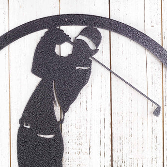 Close up of male golfer metal sign in silver vein powder coat.