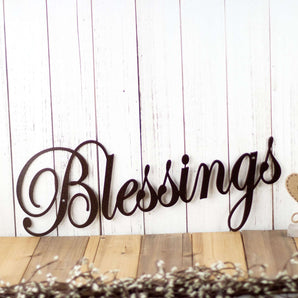Blessings metal sign with cursive lettering, in copper vein powder coat.