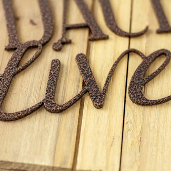 Close up of copper vein powder coat on our Dachshund metal wall art. 