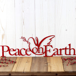 Christmas peace on earth metal wall art with peace dove silhouette, in red powder coat. 