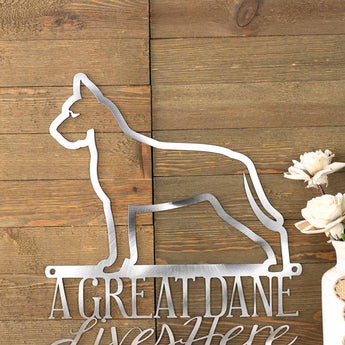Close up of Great Dane dog silhouette on metal sign, in raw steel.