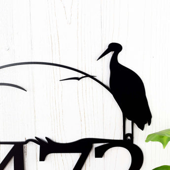 Close up of heron on our metal house number sign, in matte black powder coat. 