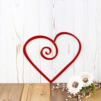 Curly heart metal sign, in red gloss powder coat.