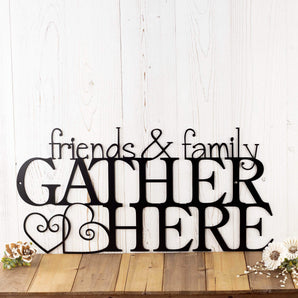 Friends & Family Gather Here metal wall decor with hearts, in matte black powder coat. 