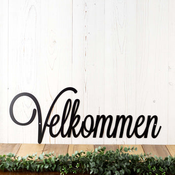 Velkommen welcome metal sign with script lettering, in matte black powder coat. 