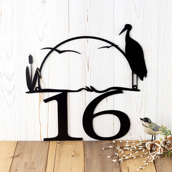 Close up of house number on our heron and cattails metal sign, in matte black powder coat. 