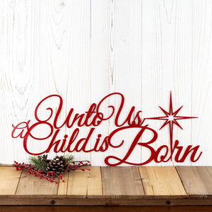 Unto Us A Child Is Born metal wall art with Christmas star, in red gloss powder coat. 