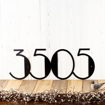 4 digit horizontal metal modern house number sign, in matte black powder coat. 