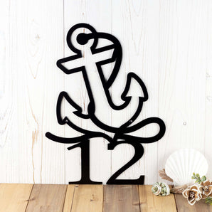 Metal house number sign with a nautical boat anchor, in matte black powder coat.