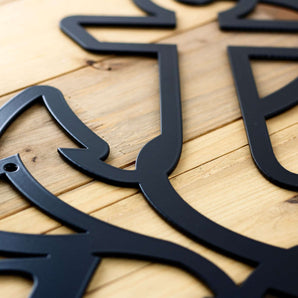 Close up of matte black powder coat on the anchor house number.