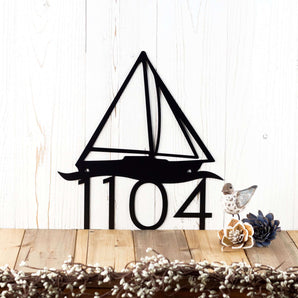 4 digit metal house number sign with sailboat silhouette, in matte black powder coat. 