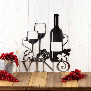 Vino metal plaque with wine glasses, bottle, and grapes, in raw steel.
