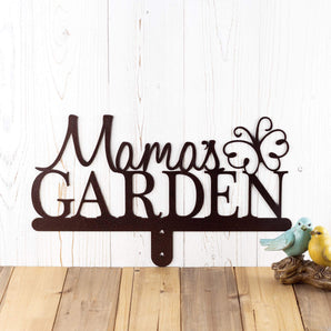 Garden name metal sign for yard, with a butterfly silhouette, in copper vein powder coat.