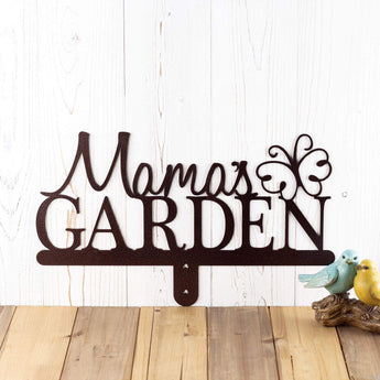 Garden metal name sign with script first name, with a butterfly, in copper vein powder coat. 