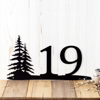 Close up of 2 digit pine tree house number sign, in matte black powder coat.