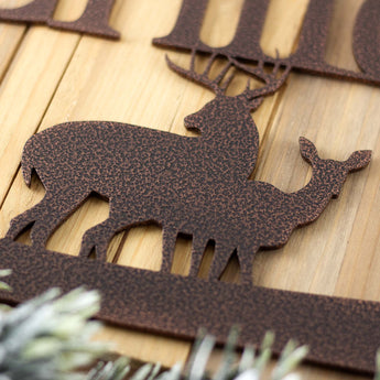 Close up of copper vein powder coat of our buck and doe deer metal wall art. 
