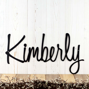 Personalized name metal sign with script lettering, in matte black powder coat. 