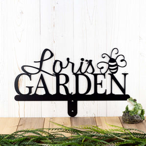 Garden metal name sign with a bumble bee silhouette, in matte black powder coat. 