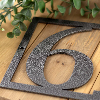 Close up of silver vein powder coat, on our 4 digit metal house number sign. 