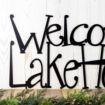 Close up of Welcome to Our Lake House wording on our metal plaque, in matte black powder coat. 