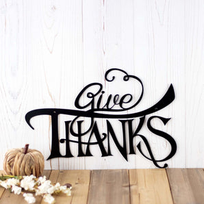Give Thanks metal wall art with script lettering, in matte black powder coat. 