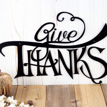 Close up of Give Thanks lettering on our metal sign, in matte black powder coat. 