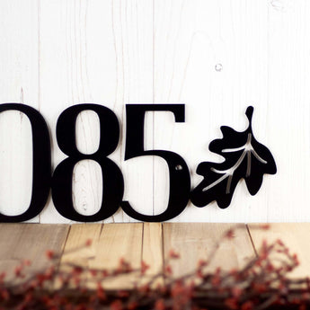 Close up of oak leaf on our metal house number sign, in matte black powder coat. 
