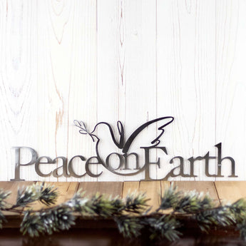 Christmas peace on earth metal wall decor with peace dove silhouette, in raw steel.
