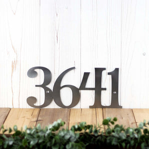 4 digit metal house number plaque, in raw steel. 