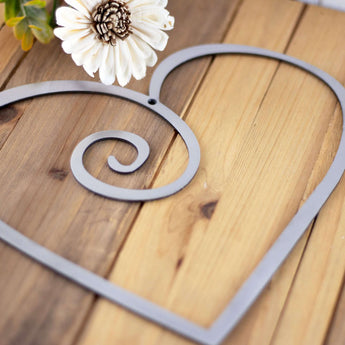 Heart metal sign, in raw steel. 