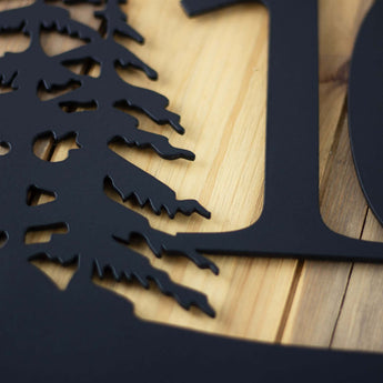 Close up of matte black powder coat on our 3 digit metal house number sign. 