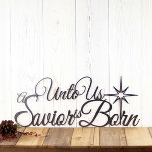 Unto Us a Savior is Born metal sign, with a Christmas star, in silver vein powder coat.