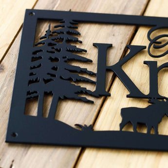 Close up of matte black powder coat on our personalized family name sign. 