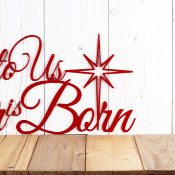 Close up of Christmas star on our Unto Us A Savior Is Born metal sign, in red gloss powder coat.