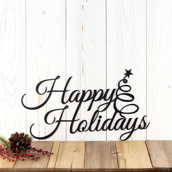 Happy Holidays metal wall art with Christmas tree, in matte black powder coat. 
