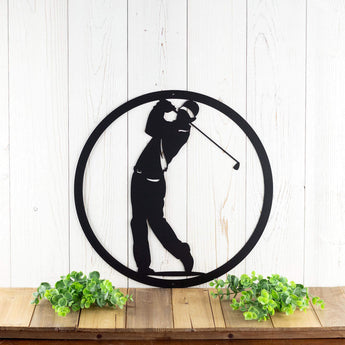 Circular golfer metal wall art in matte black powder coat.