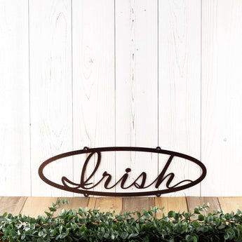 Oval family last name metal sign with script font, in copper vein powder coat. 