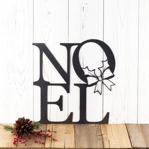 Noel metal wall art with Christmas wreath, in silver vein powder coat.