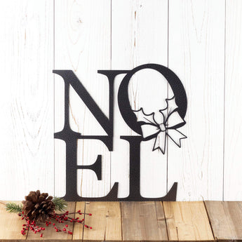Noel metal wall art with Christmas wreath, in silver vein powder coat.