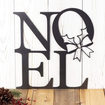 Noel metal sign with Christmas wreath, in silver vein powder coat.