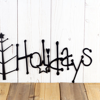 Close up of wording on our Happy Holidays metal sign, in matte black powder coat.