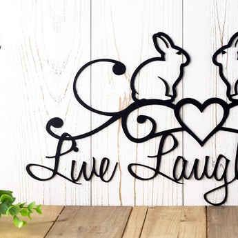 Close up of wording on our Live Laugh Love metal sign, in matte black powder coat. 