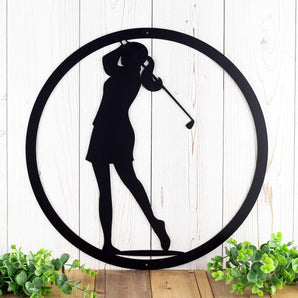 Circular golf metal wall decor with woman silhouette, in matte black powder coat.