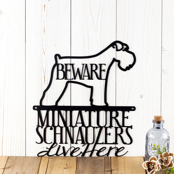 Miniature Schnauzers Live Here metal wall decor, with Beware, in matte black powder coat.