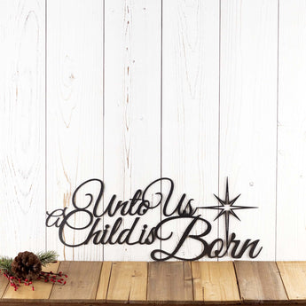 Unto Us A Child Is Born metal wall art with Christmas star, in silver vein powder coat. 